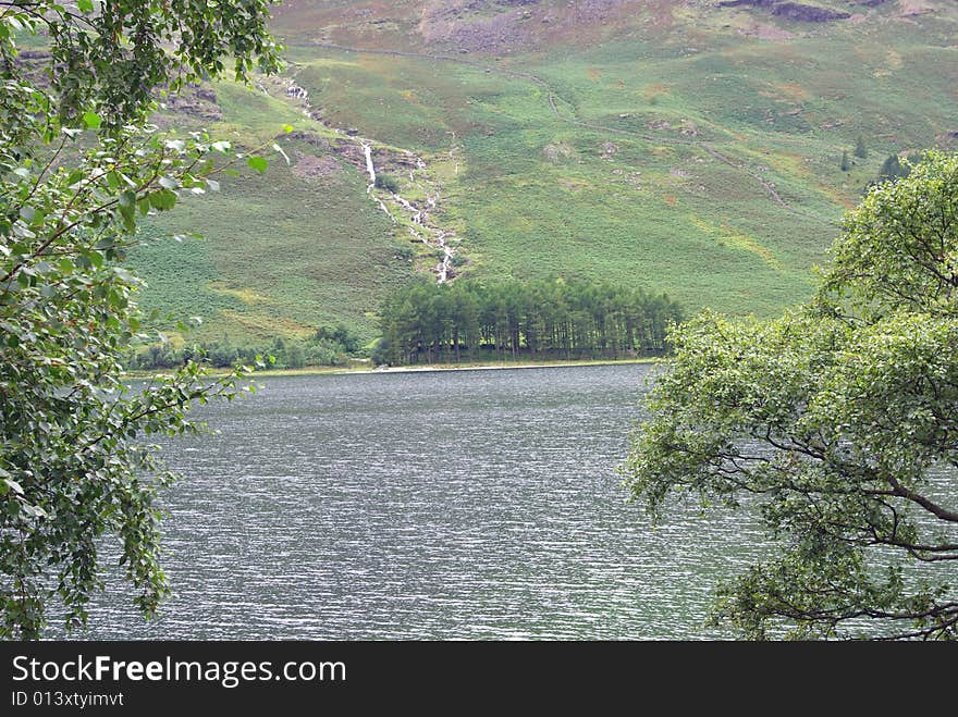 View Across Buttermere Water in the Lake District Cumbria England. View Across Buttermere Water in the Lake District Cumbria England.