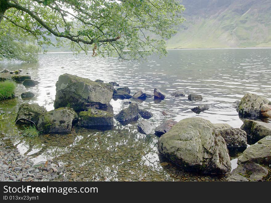 View across Crummock Water in the Lake District Cumbria ENGLAND. View across Crummock Water in the Lake District Cumbria ENGLAND