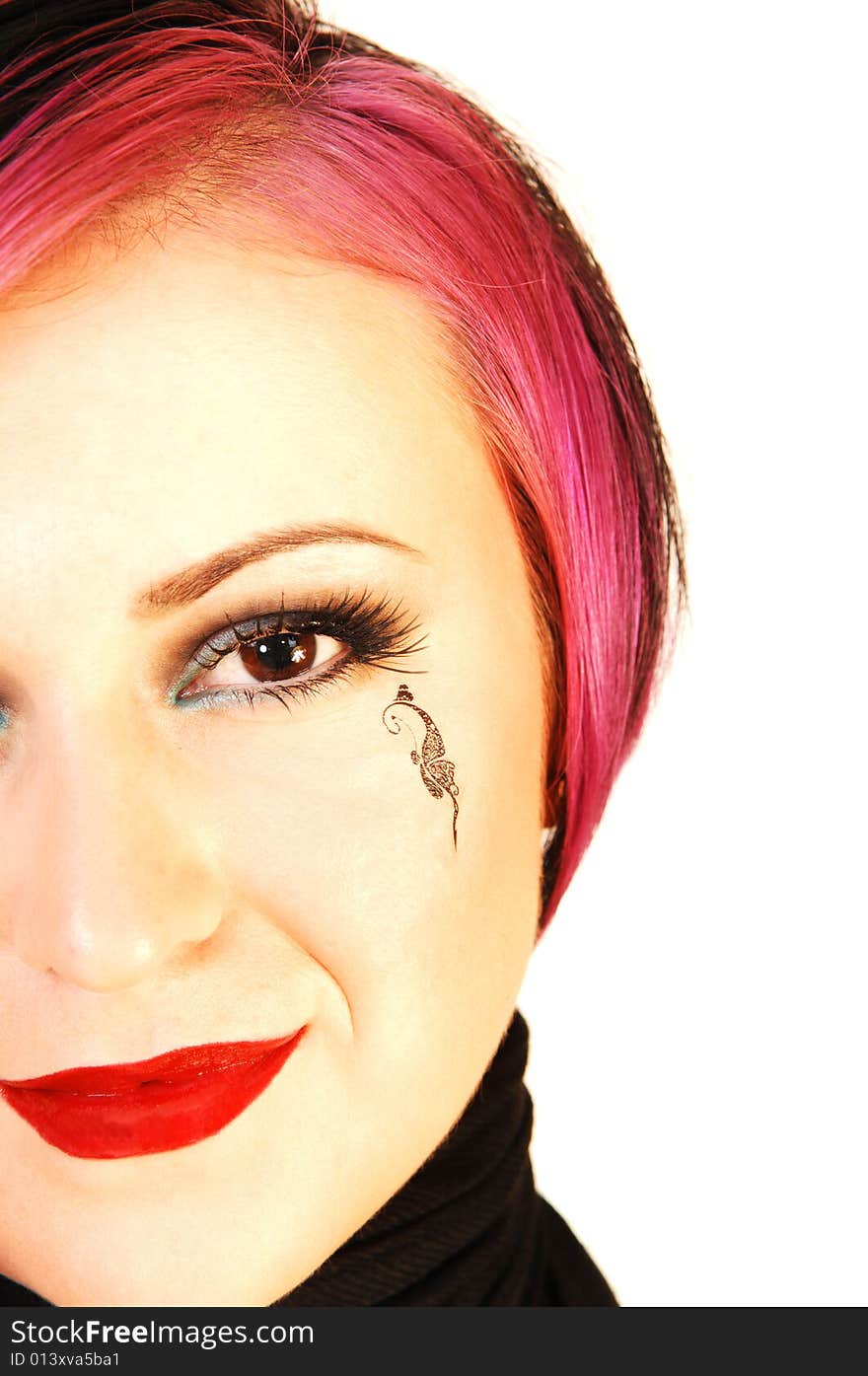 An close up heath shot of a lovely, beautiful young woman with a
black butterfly on her cheek. An close up heath shot of a lovely, beautiful young woman with a
black butterfly on her cheek.