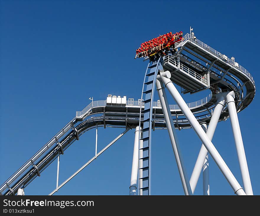 Blue Roller Coaster With People