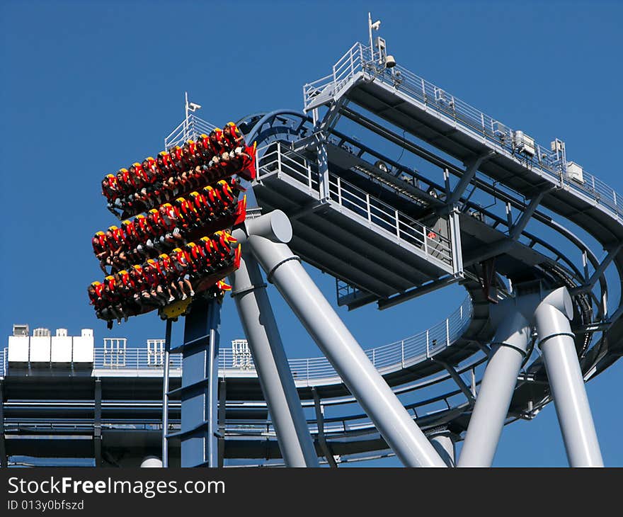 Blue Roller Coaster With People