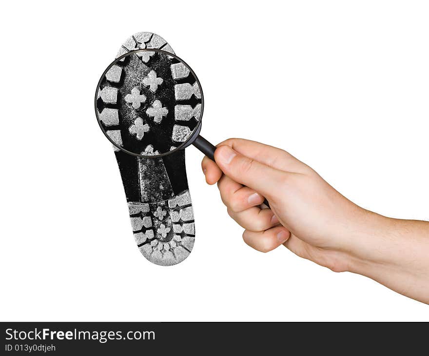 Magnifying glass in hand and shoe printout isolated on white background