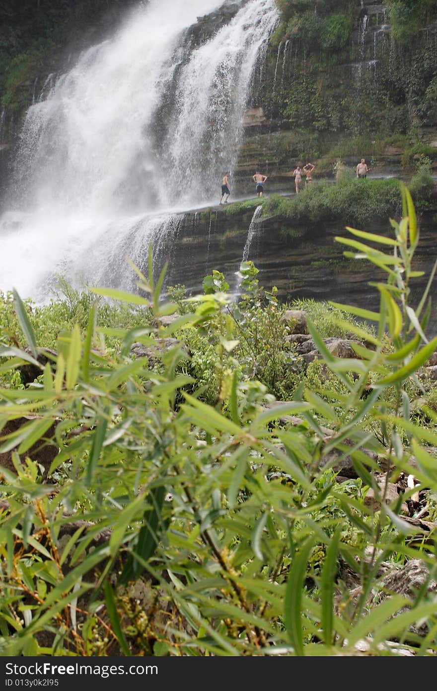 Playing Near The Waterfall