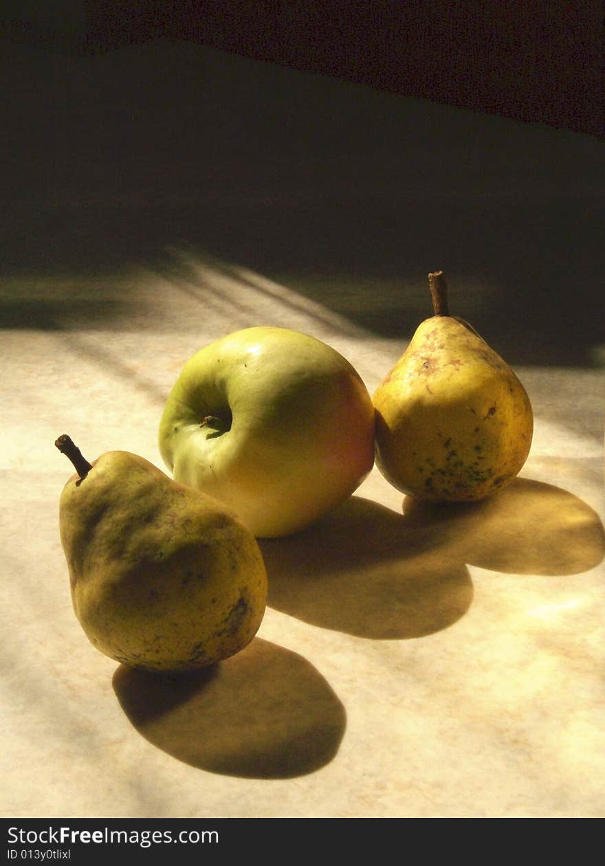 The sweet juicy green fruit with a rounded shape that becomes narrower towards the stalk. The sweet juicy green fruit with a rounded shape that becomes narrower towards the stalk.