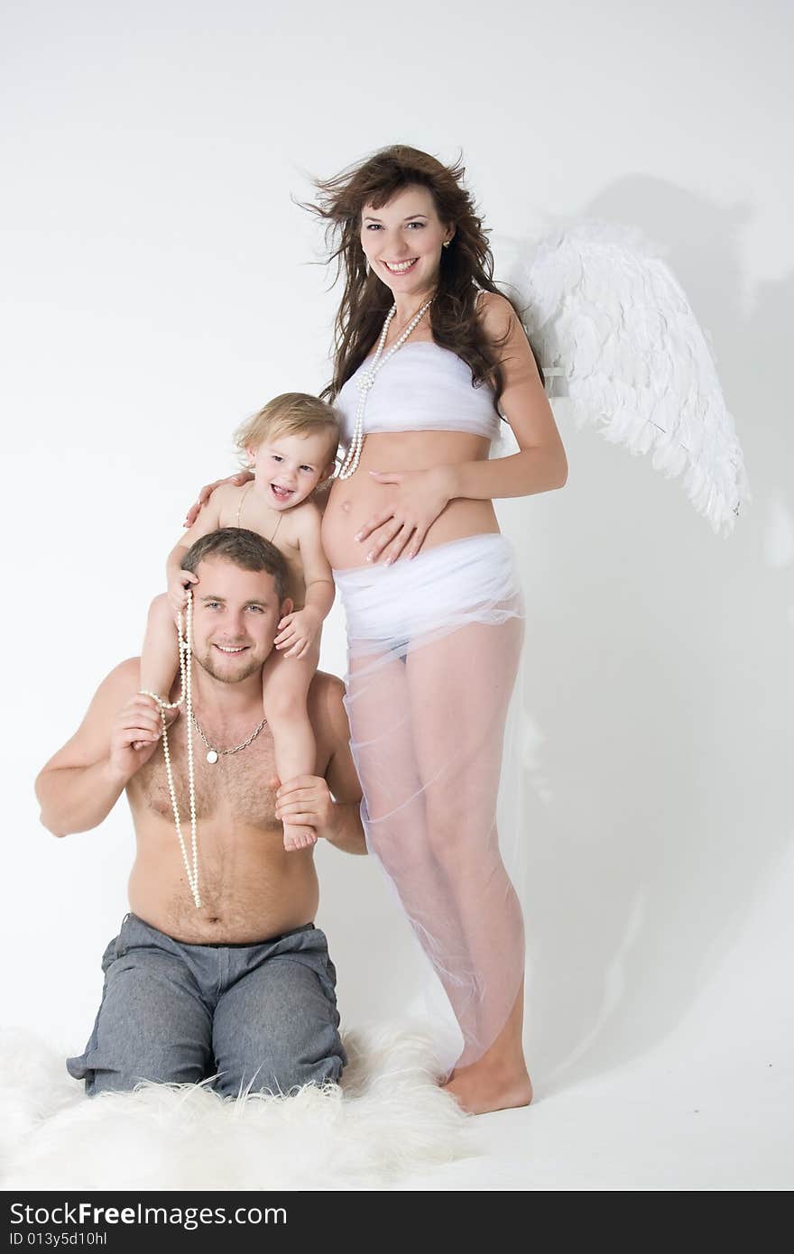 Father, daughter and mother with wings of angel. Father, daughter and mother with wings of angel