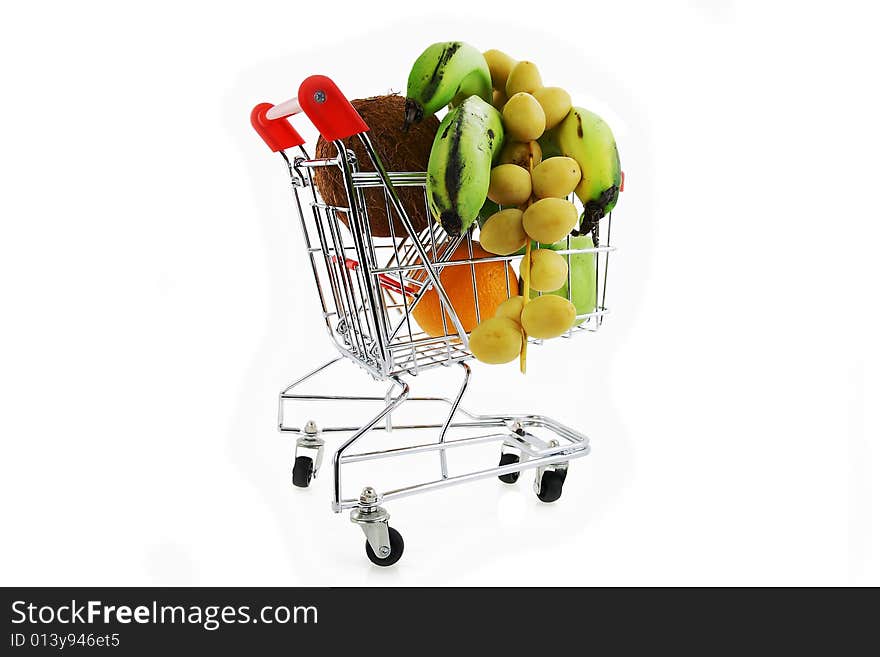 The container on wheels and tropical fruit. The container on wheels and tropical fruit