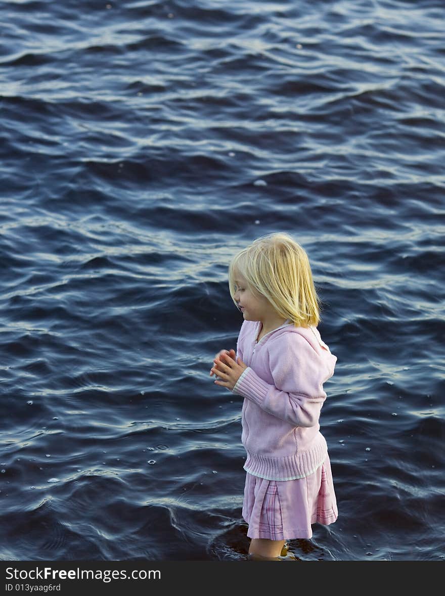 Girl in Pink Wading