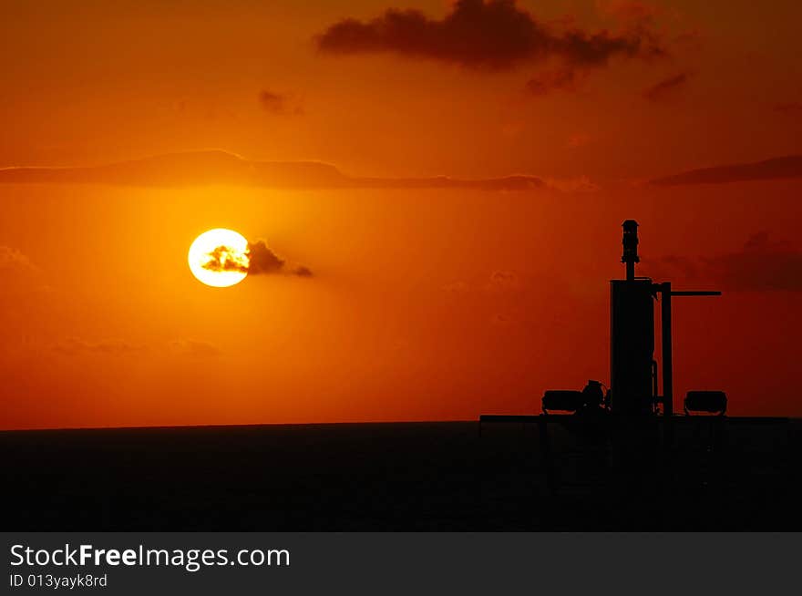 This picture is a boat in the sunset during voyage on the Mediterraneansea. This picture is a boat in the sunset during voyage on the Mediterraneansea