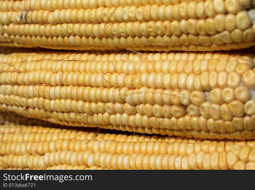 The heap of yelloy indian corn as background