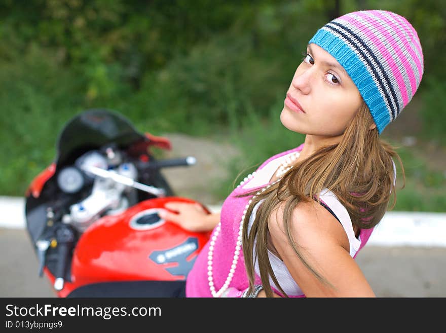 Closeup portrait of girl on bike in the nature. Closeup portrait of girl on bike in the nature