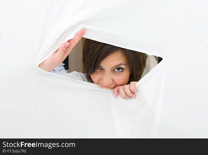 Opening white canvas. Attractive girl over white background.