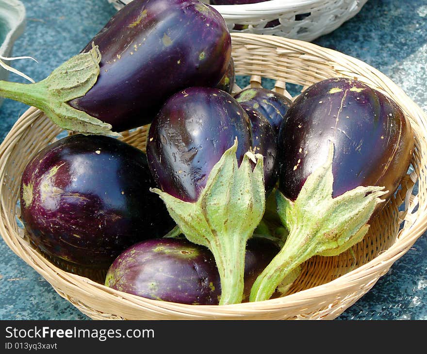 Eggplants on display at a farmer's market