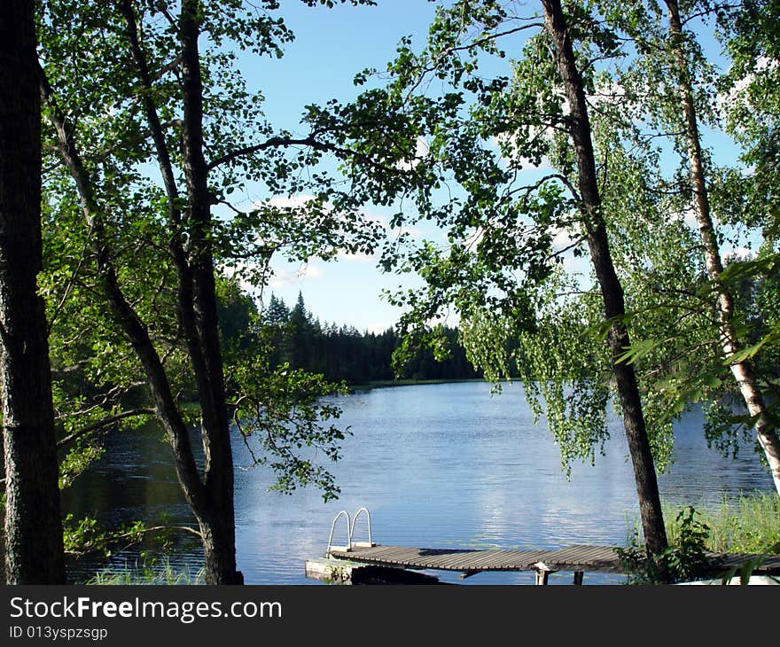 Wharf in a lake in Finland. Wharf in a lake in Finland