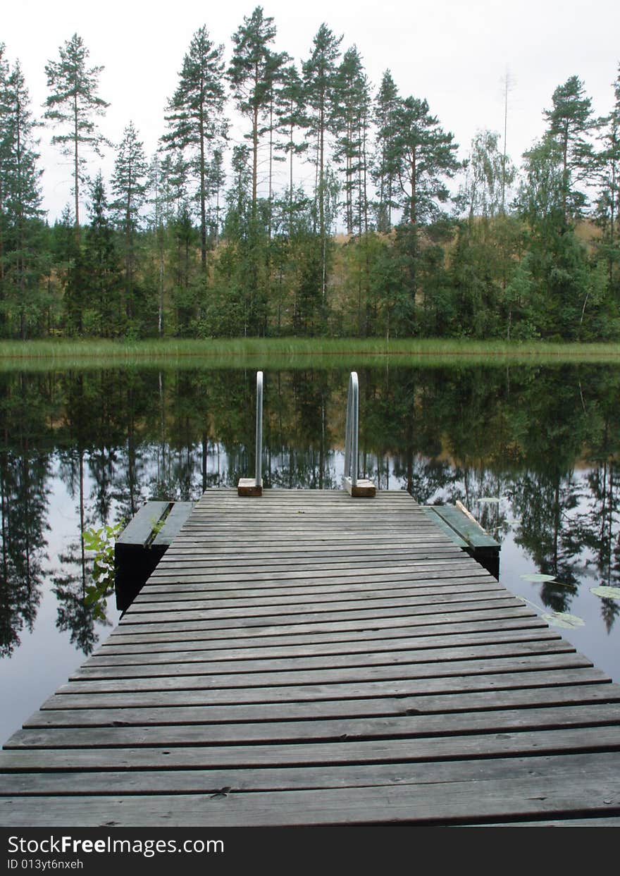 Wharf in a lake in Finland. Wharf in a lake in Finland