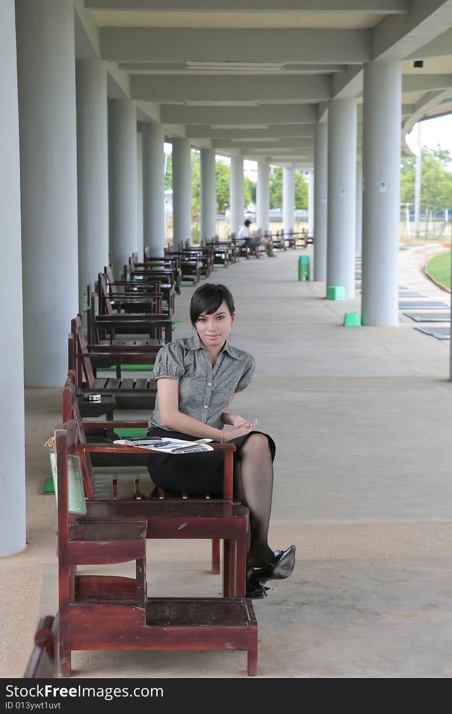 Girl at Golf driving range