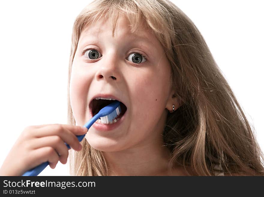 Little girl with toothbrush on neutral background. Little girl with toothbrush on neutral background