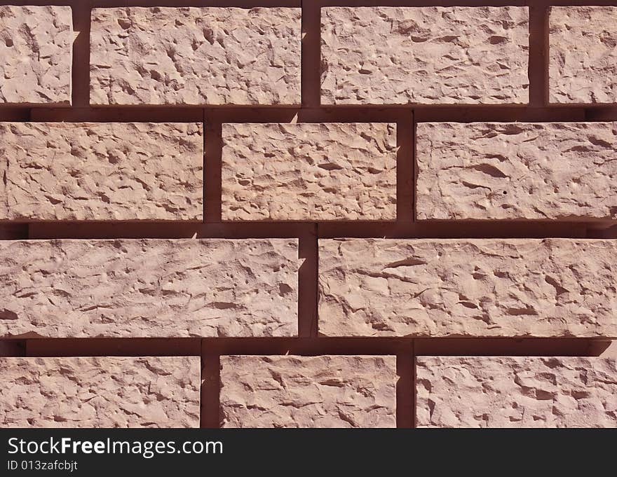 Brick background from wall with spaces between briskc