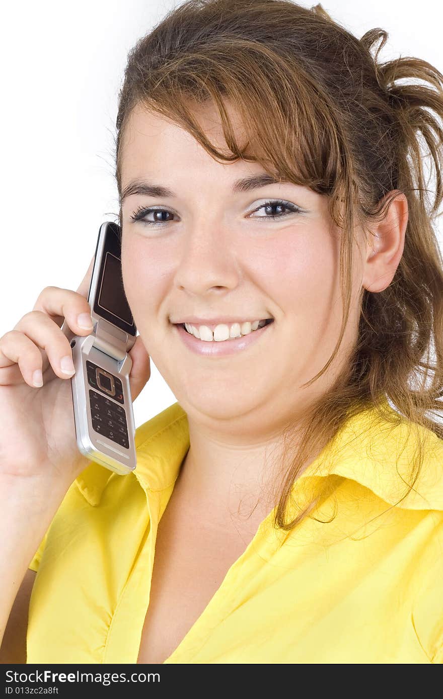 Girl talking on the phone isolated on white background