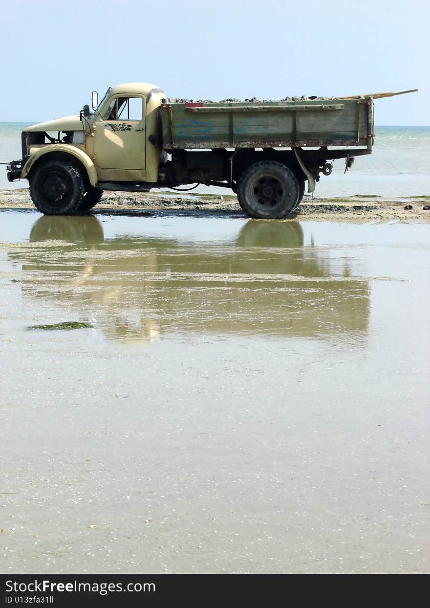 The old car on seacoast