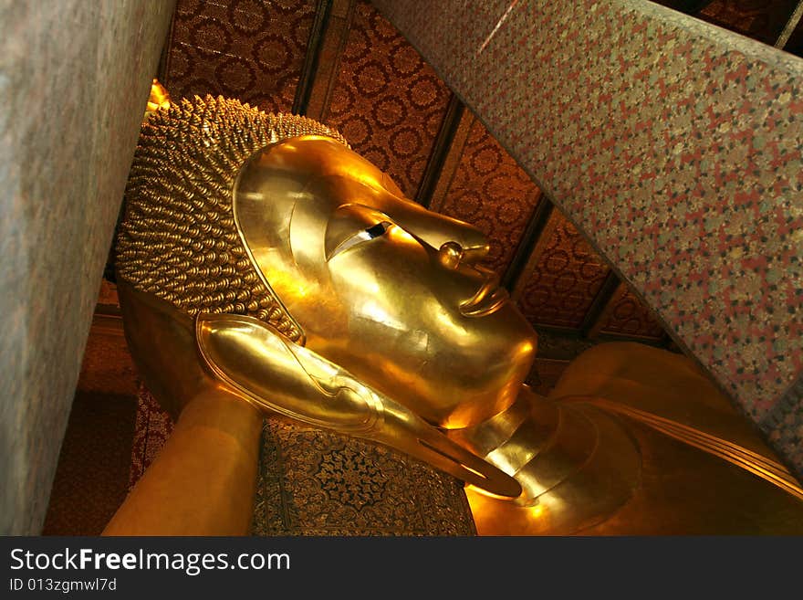 A recline Buddha in a palace  at Bangkok. A recline Buddha in a palace  at Bangkok