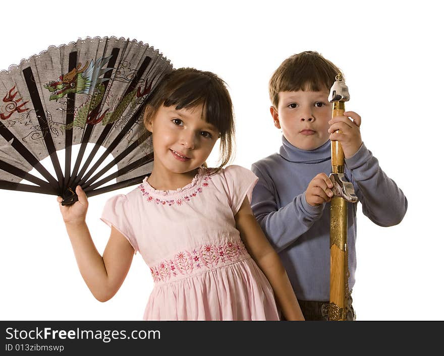 Boy with sword and girl with fan on white. Boy with sword and girl with fan on white