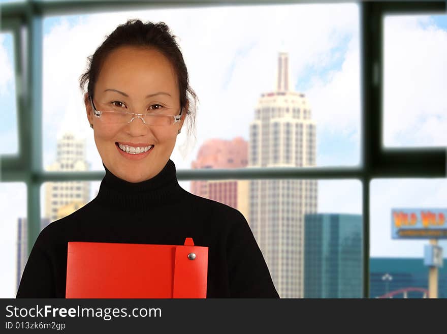 Young Attractive business woman with folder