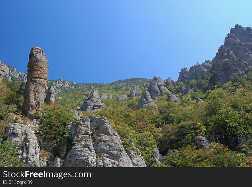 Stone giant on a  blue sky background