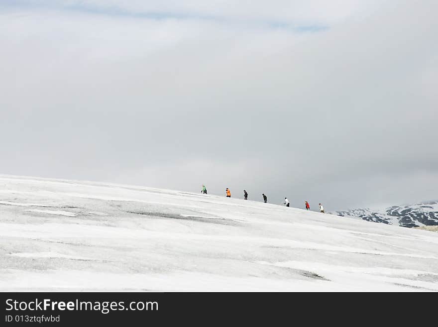 Explorers in a glacier