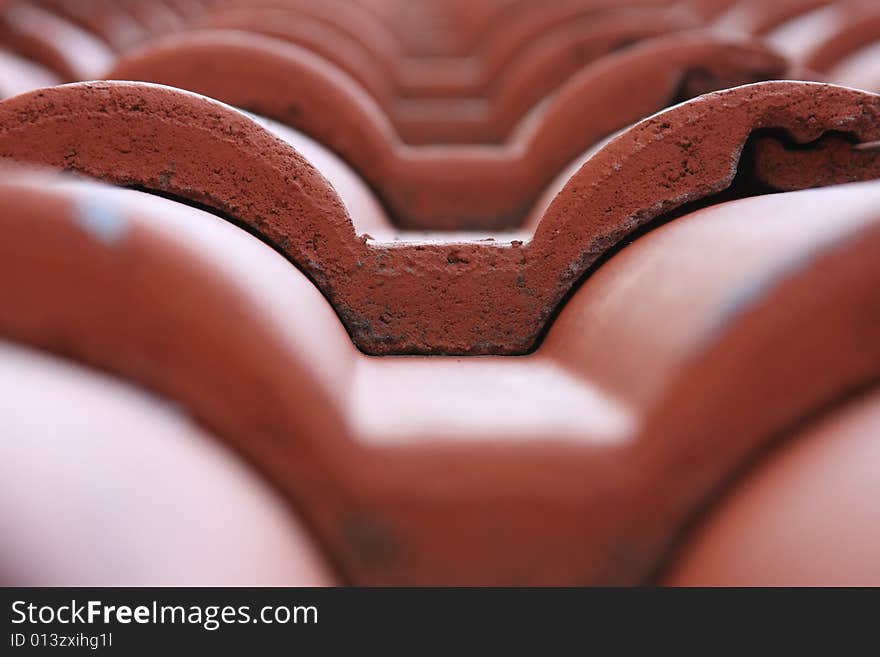 Wavy tiles on a rooftop forming a nice pattern. Note: Shallow depth of field