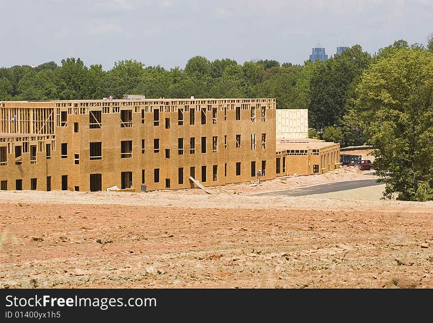 New apartments under new wood construction. New apartments under new wood construction