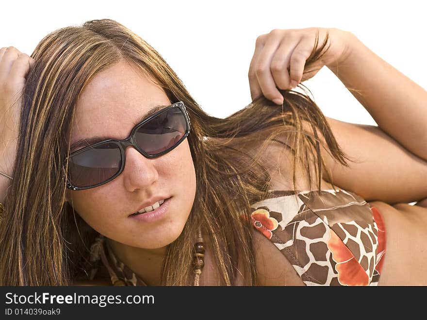 Girl sunbathing and relaxing on the beach. Girl sunbathing and relaxing on the beach