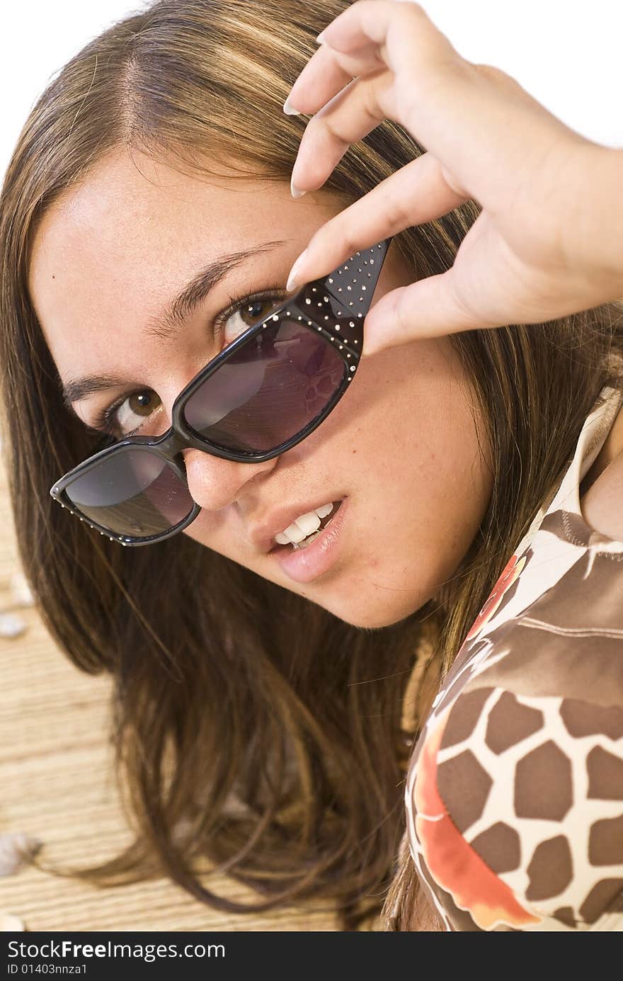 Girl sunbathing and relaxing on the beach. Girl sunbathing and relaxing on the beach