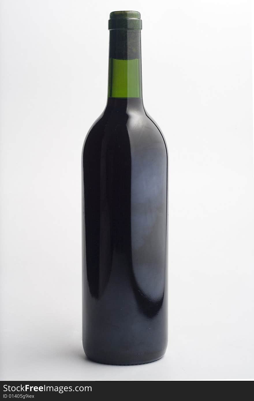 Bottle and glass of red wine