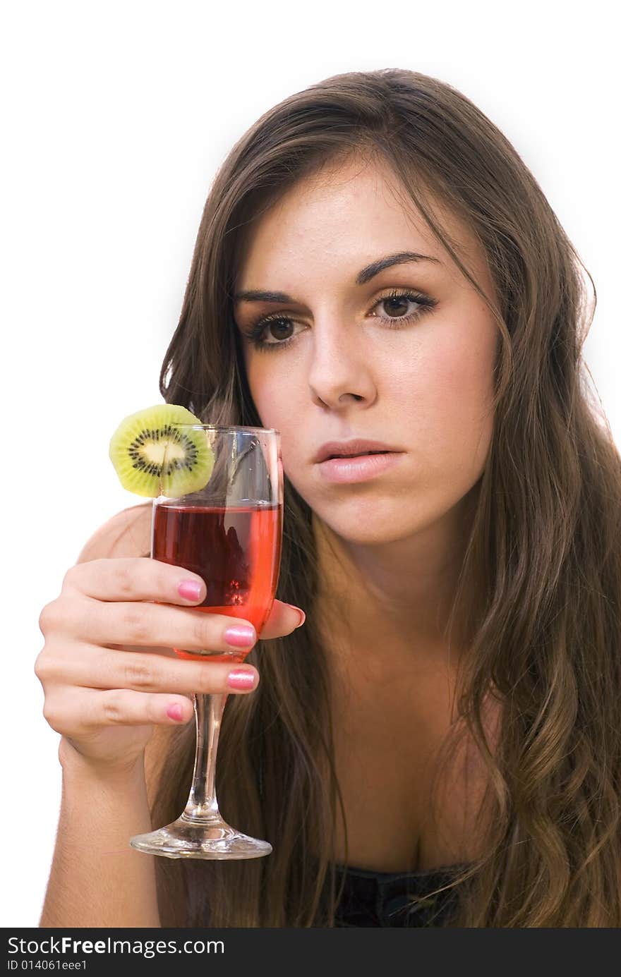 Girl sitting and drinking cocktail with kiwi