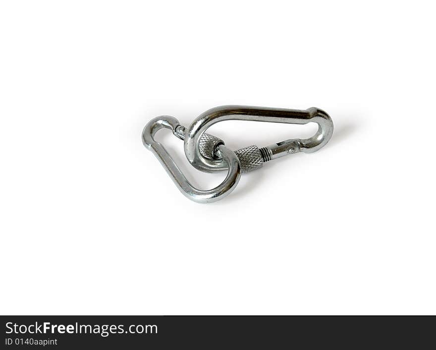 Two fastened clasps lying on white background