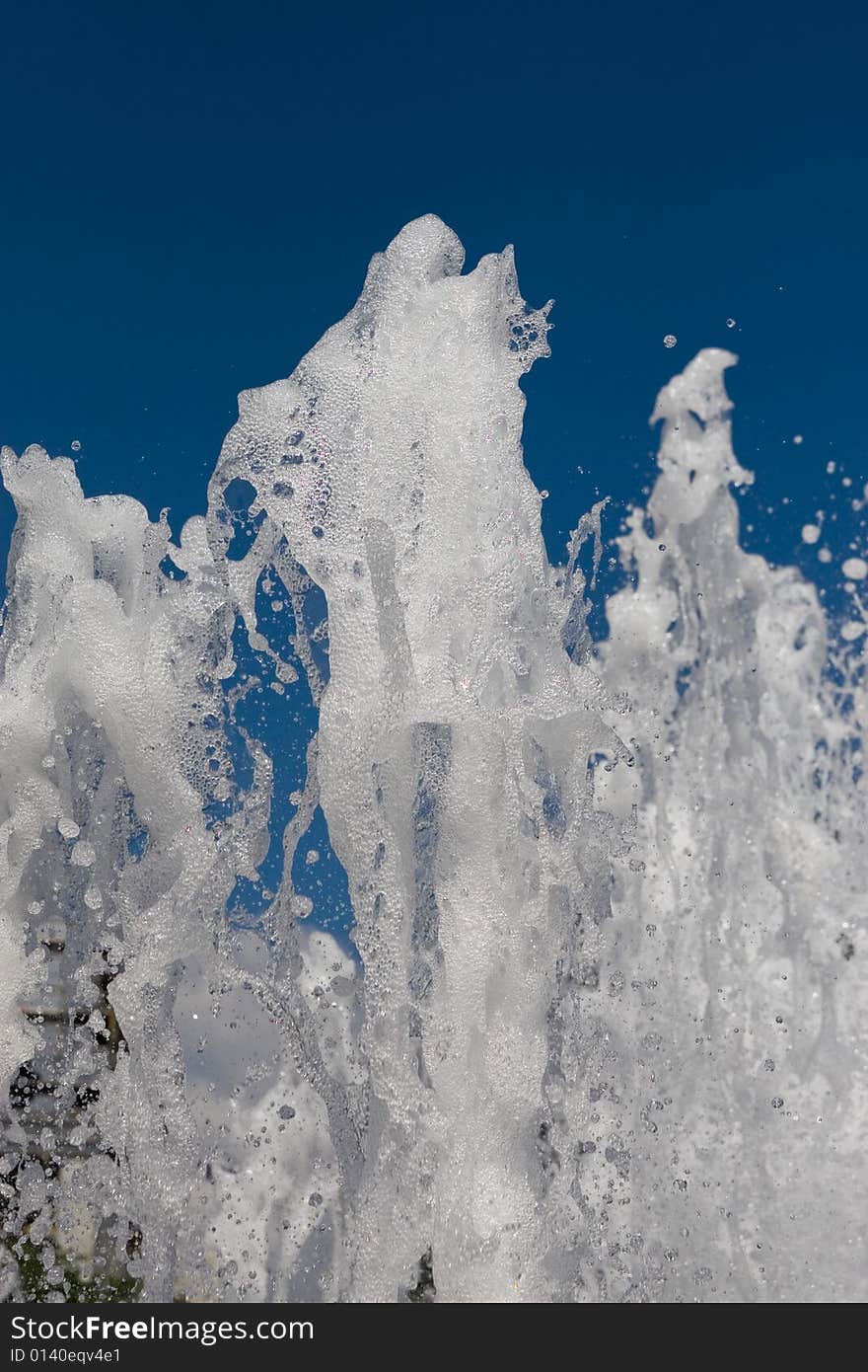 Out door fountain on the blue sky background