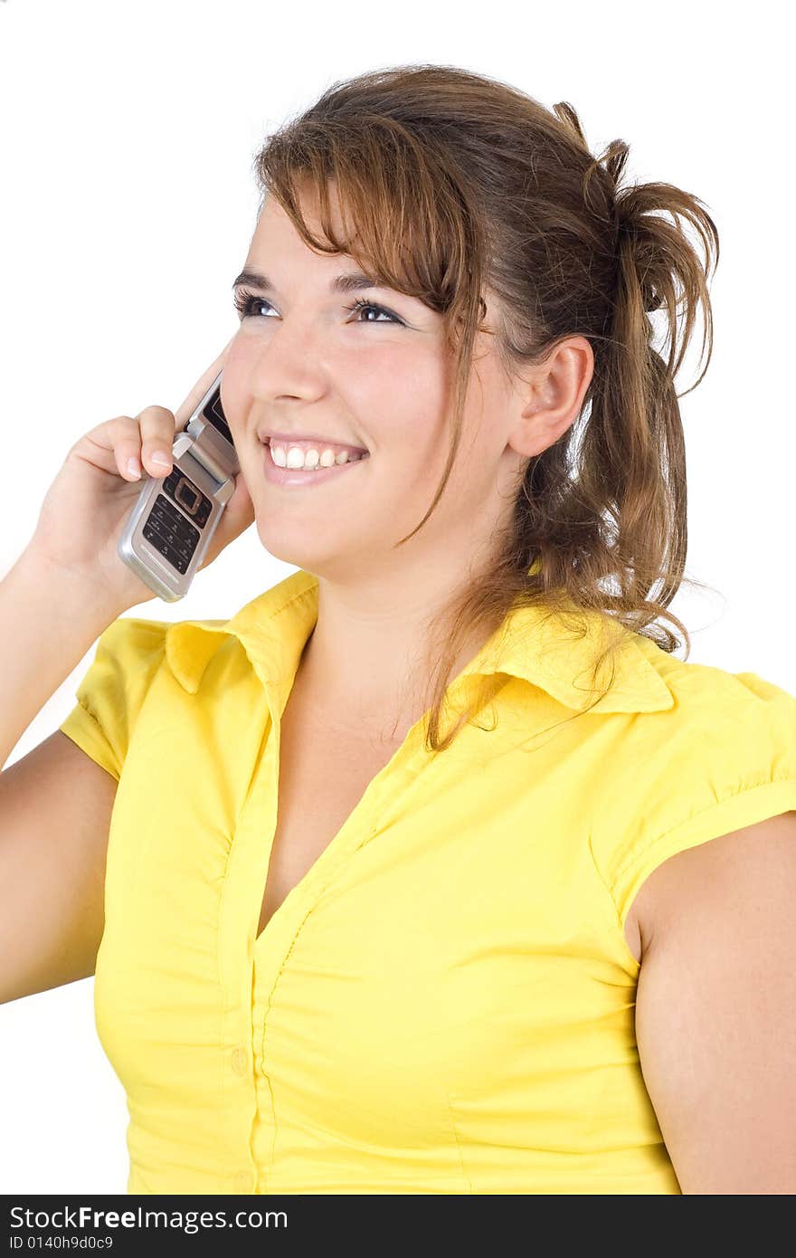 Girl talking on the phone isolated on white background