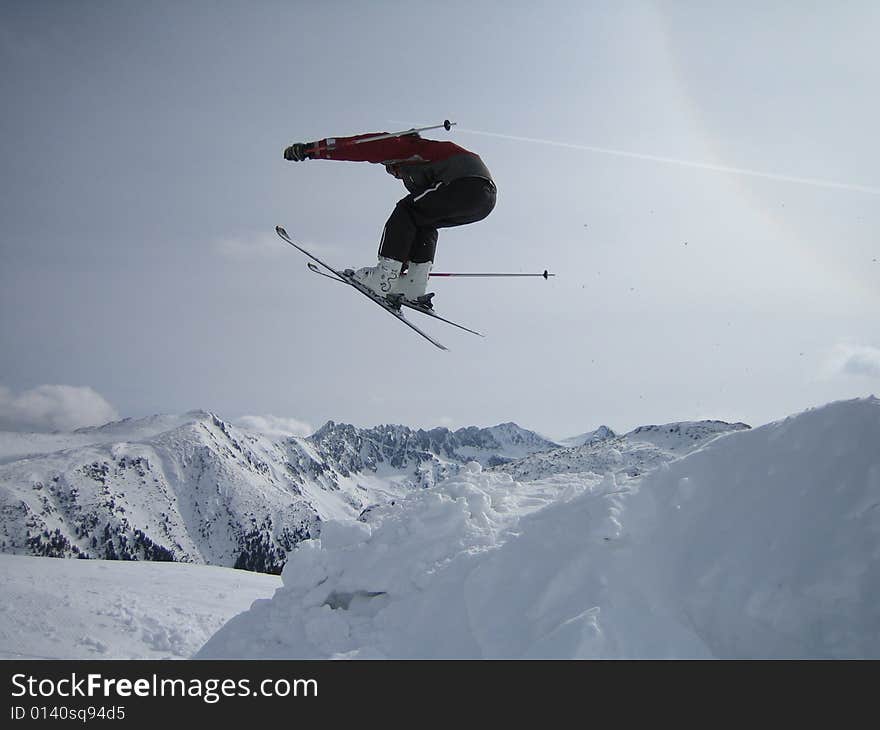 Man jump on sky in mountains. Man jump on sky in mountains