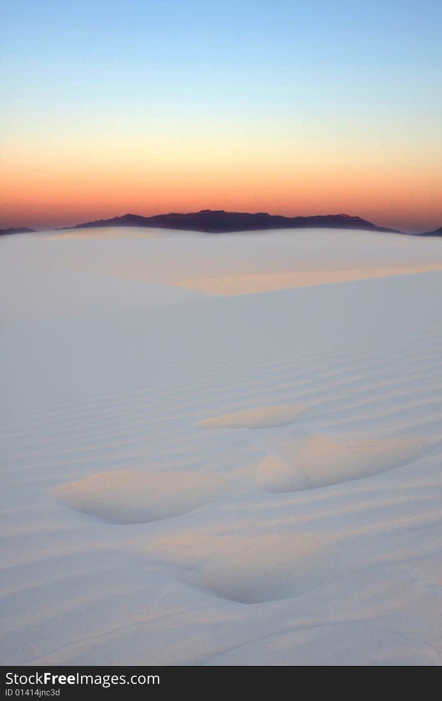 An image of sunrise in the desert