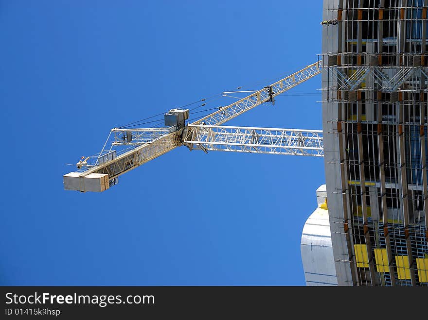 Photographed crane at construction site in Orlando Florida. Photographed crane at construction site in Orlando Florida