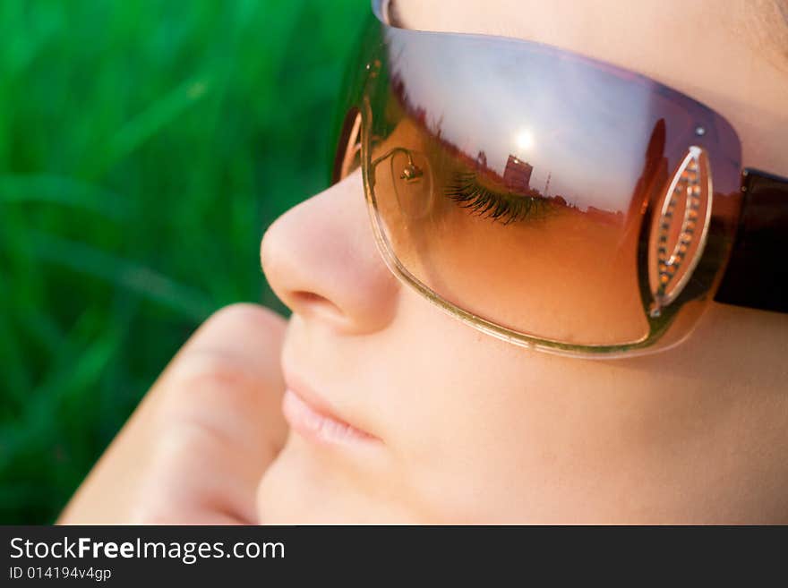 Young girl in sunglasses