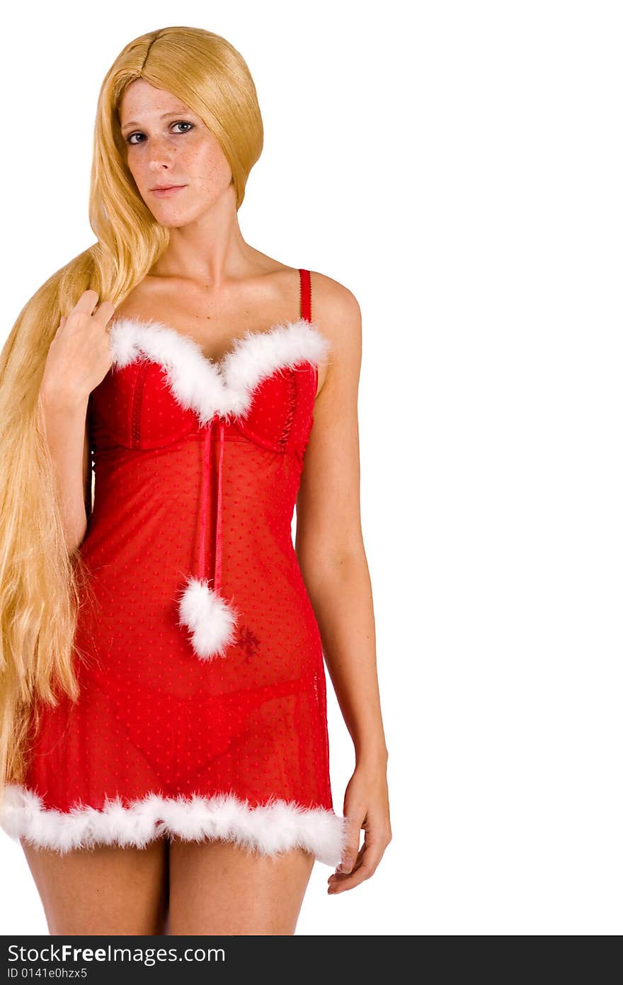 Studio portrait of blond Christmas girl with very long blond hair posing. Studio portrait of blond Christmas girl with very long blond hair posing