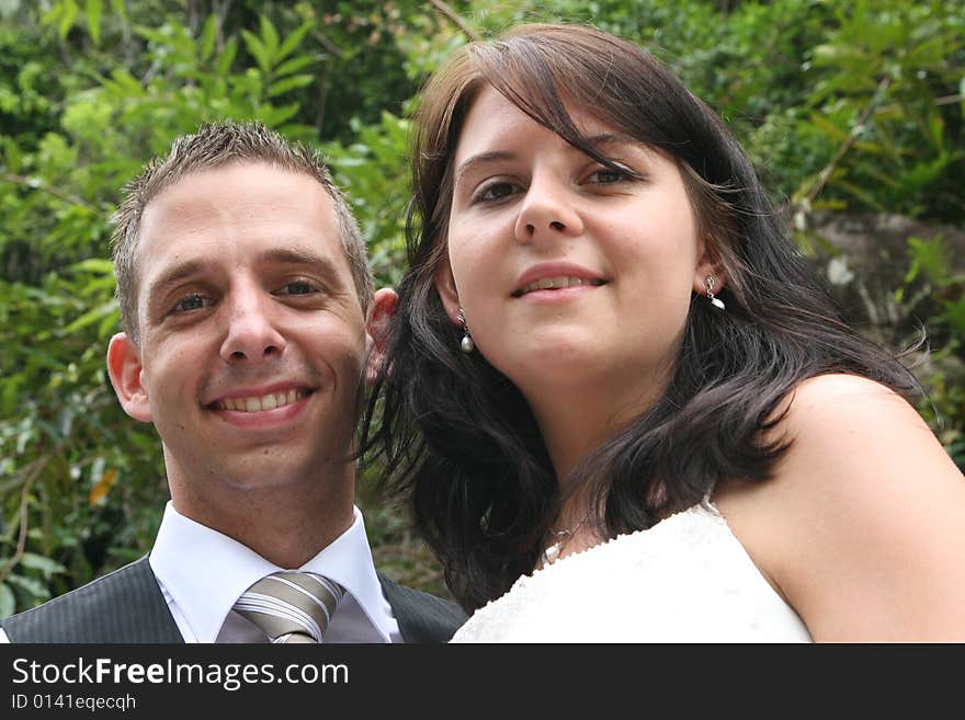 Happy young bride and groom on their wedding day.