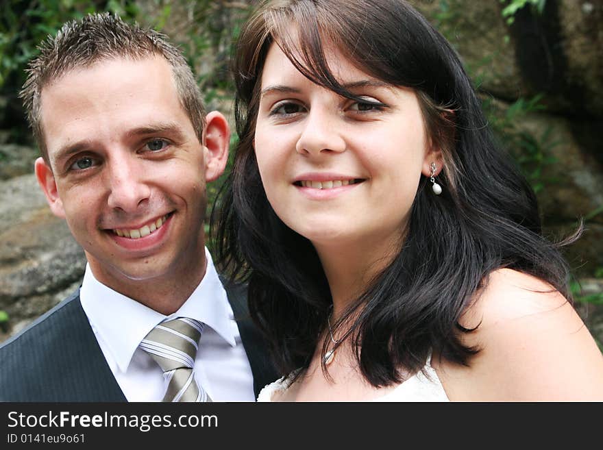 Happy young bride and groom on their wedding day.