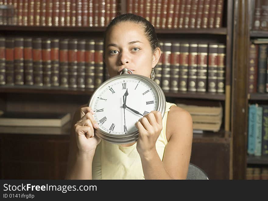 Woman Holding Clock