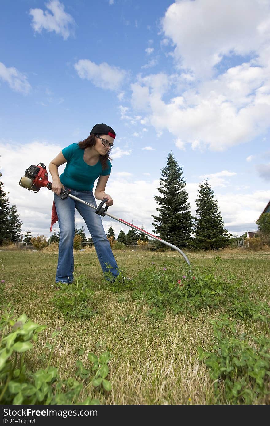 Woman With Weedwacker