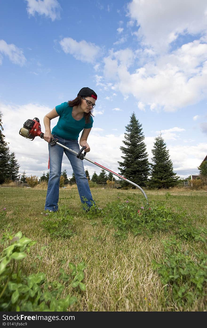 Woman With Weedwacker