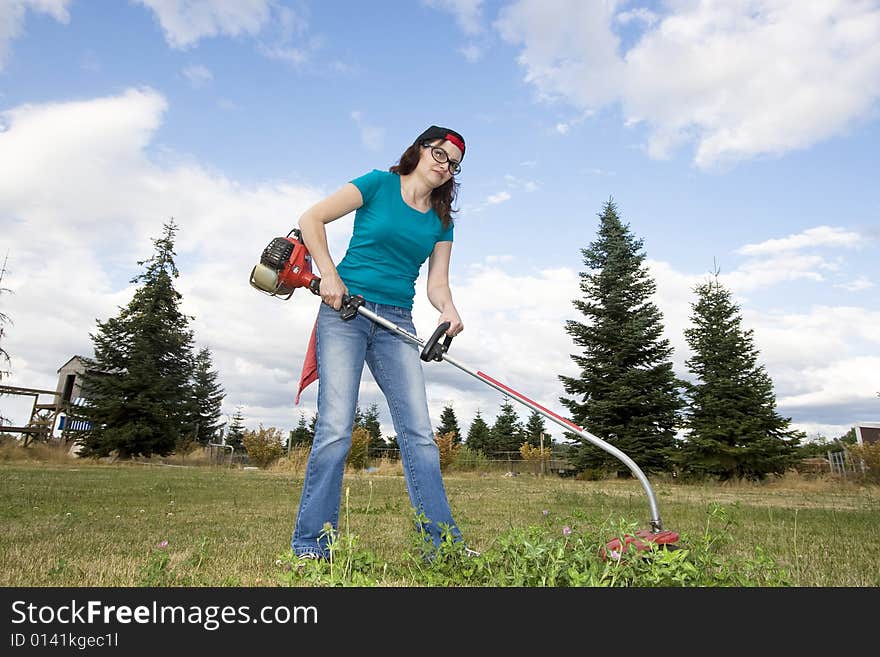 Woman with Weedwacker