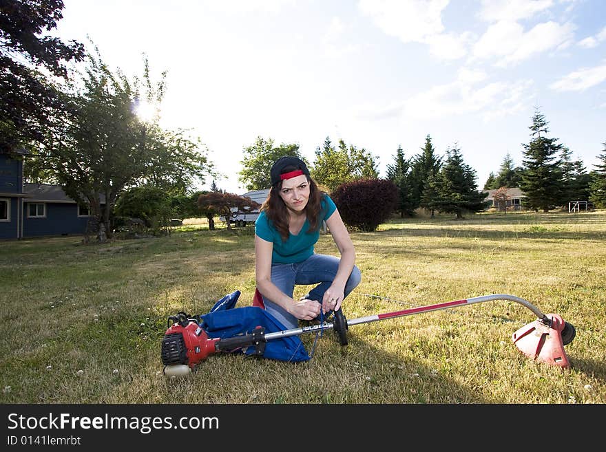 Woman with Weedwacker