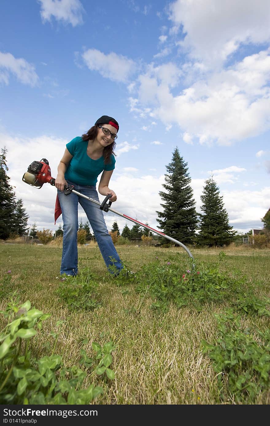 Woman with Weedwacker